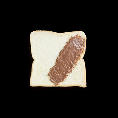 Closeup slice bread with chocolate for breakfast with shadow isolated on black background