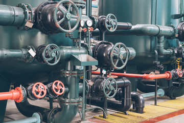 steel pipelines and cables in a plant,Industrial zone.