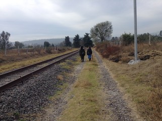Fototapeta na wymiar Walking near the railroad track