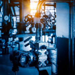 steel pipelines and cables in a plant,Industrial zone.