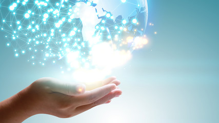 Hand holding glowing globe. World connected. Social network concept.