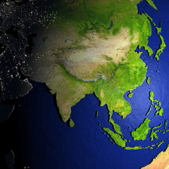 Asia on model of Earth with embossed land