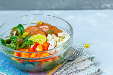 Vegan buddha bowl with green salad, tofu and sweet potato. Love for a healthy vegan food concept