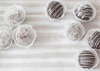 Sweet chocolate cake on a wooden tray