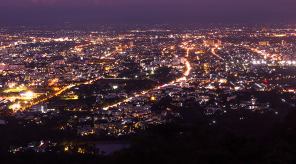 Fototapeta na wymiar the night light of Chiangmai city, Thailand view from mountain in twilight period