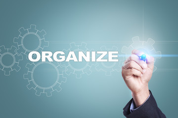 Businessman drawing on virtual screen. organize concept.