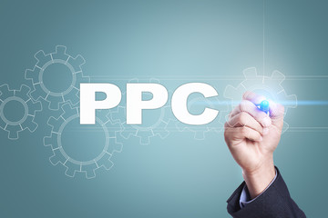 Businessman drawing on virtual screen. ppc concept.