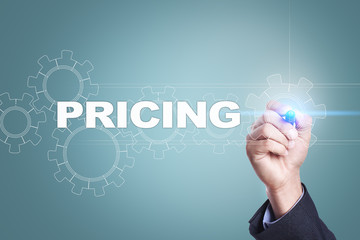 Businessman drawing on virtual screen. pricing concept.