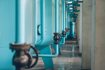steel pipelines and cables in a plant,Industrial zone.