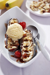 Banana split with vanilla ice creams and cherry