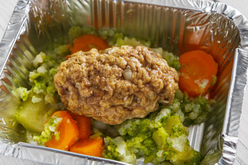 Healthy food in foil boxes, diet concept.