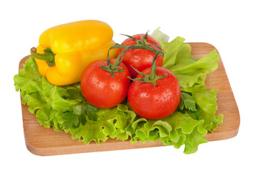 Fresh vegetables on wooden board