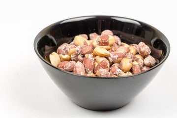 Baked saulty peanuts served in the bowl