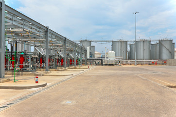 Bottom loading tank trucks terminal with tank farms