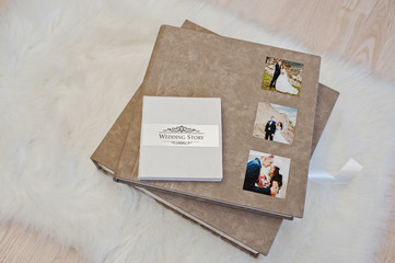 Elegant gray brown and white leather wedding book or album.