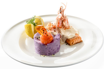 salmon fillet with champagne sauce and purple potatoes