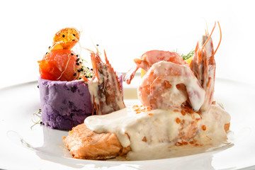 salmon fillet with champagne sauce and purple potatoes