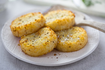 Flour potato cakes made with shredded potato, onion and seasoning