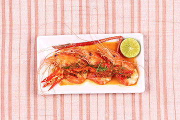 Large prawn topped spicy coconut cream curry.