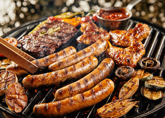 Assorted meat and vegetables on a summer BBQ