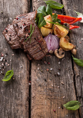 Beef steak on woode table, Fresh grilled steak with vegetable