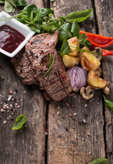 Beef steak on woode table, Fresh grilled steak with vegetable