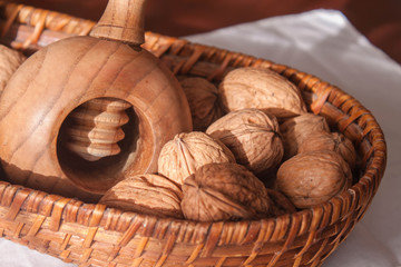 walnuts basket and wood nutcracker