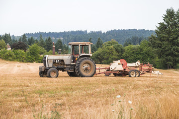 Old Tractor and Trailer Equipment in a Field
