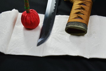 Katana Japanese sword blade and scabbard with red compress for cleaning