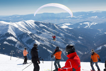 paragliding on skis, winter holiday activity, Chopok, Slovakia