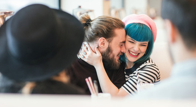 Couple Cuddling at Diner - Powered by Adobe