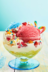 Children's ice cream sundae with sweets in glass