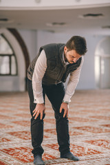 Muslim bowing humbly