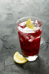 Red currant cocktail with lemon and honey