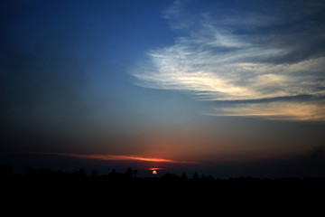 Evening sunlight and the clouds in the countryside of Thailand