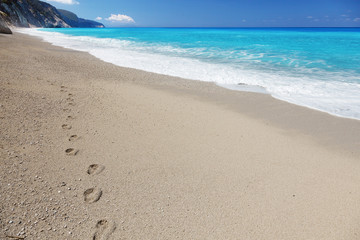 Footprints on the sandy beach, Lefkada island, Greece