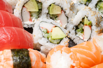 A large set of sushi and rolls top view close. Dishes from raw fish Japanese food