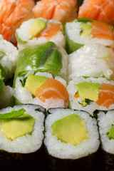 A large set of sushi and rolls top view close. Dishes from raw fish Japanese food