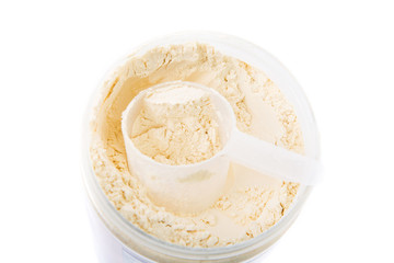 scoop of Vanilla protein in a box