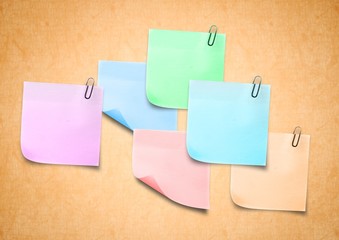 Sticky Note against a neutral orange background