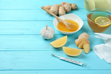 Natural ingredients for cough remedy on wooden table