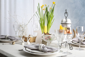Beautiful Easter table setting in light room