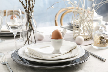 Beautiful Easter table setting in light room