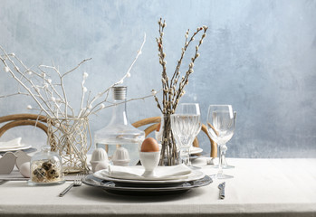 Beautiful Easter table setting in light room