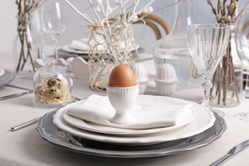 Beautiful Easter table setting in light room