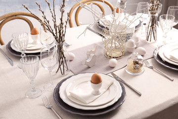 Beautiful Easter table setting in light room