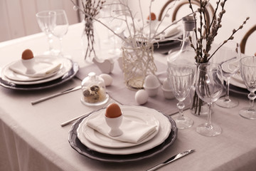 Beautiful Easter table setting in light room