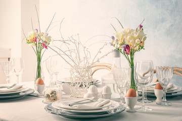 Beautiful Easter table setting in light room