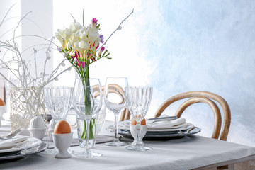Beautiful Easter table setting in light room