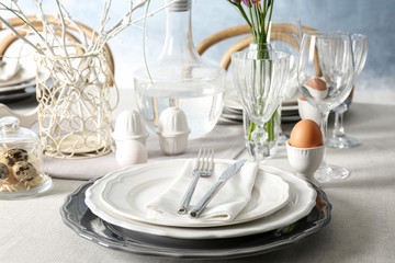 Beautiful Easter table setting in light room